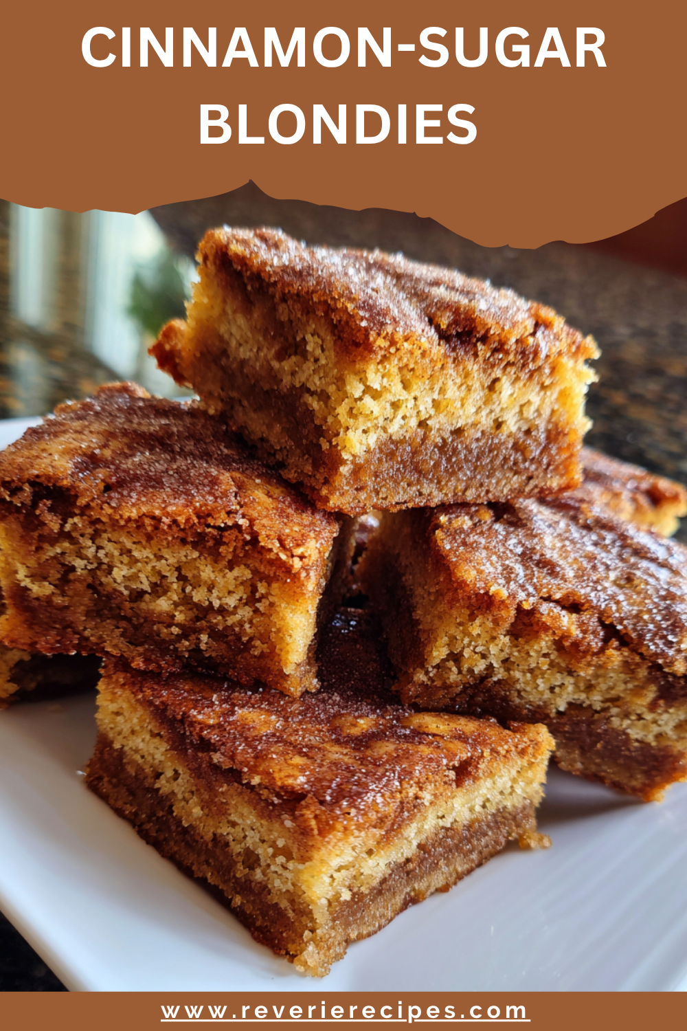 Overhead view of cinnamon-sugar blondies in a square pan with a marbled cinnamon top, cut into small bars simple one-bowl, no-pumpkin fall treat ideal for gifting.