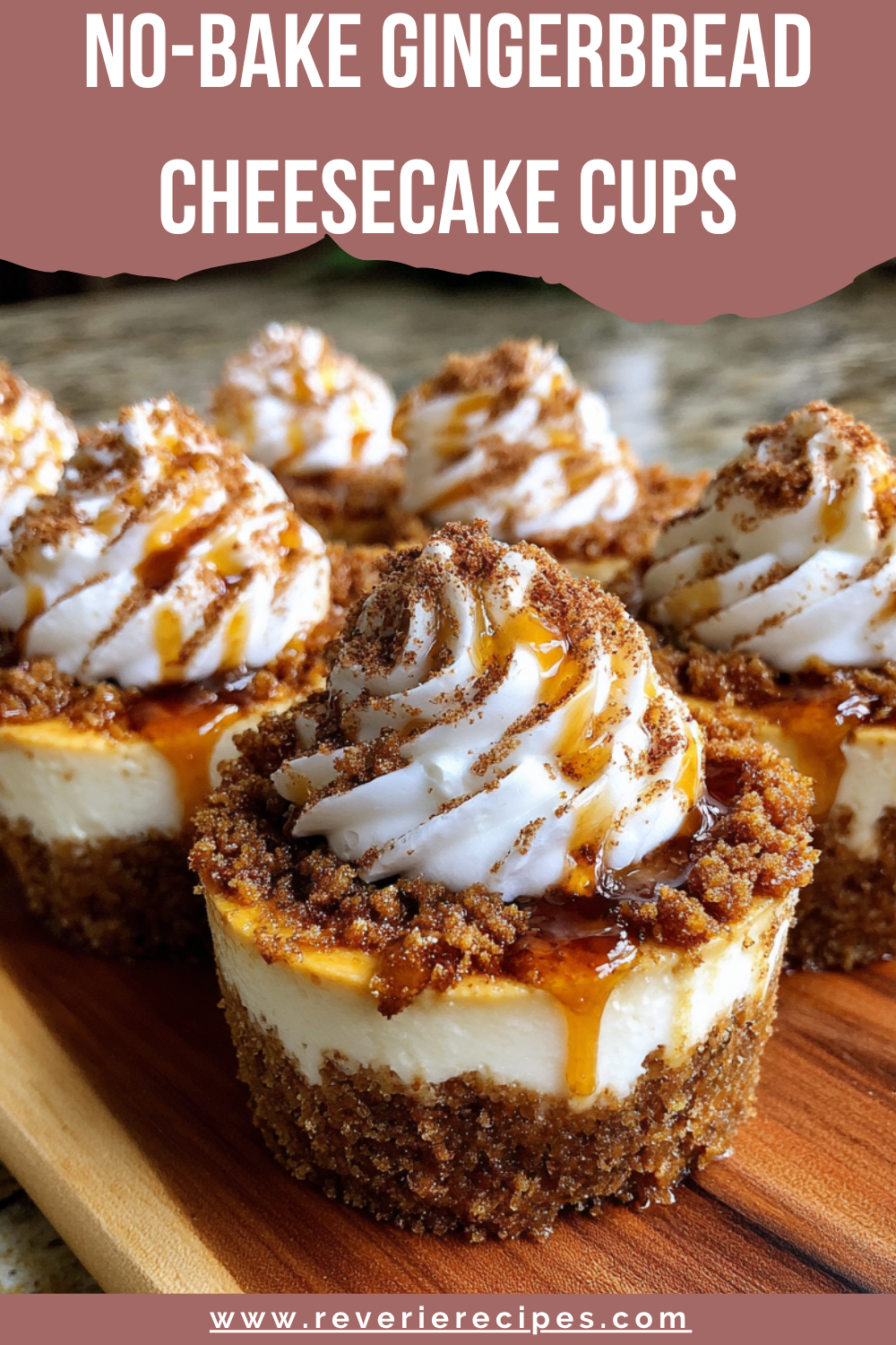 Clear dessert cups layered with gingersnap crust and molasses-spiced cheesecake, topped with a tall whipped-cream swirl and a dusting of cinnamon, festive no-bake holiday treat.
