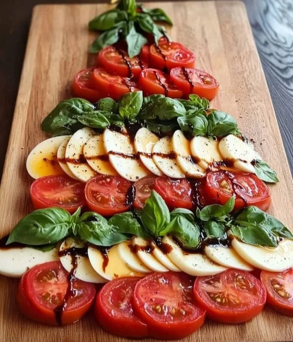 Caprese Christmas Tree, a festive arrangement of mozzarella, tomatoes, and basil.