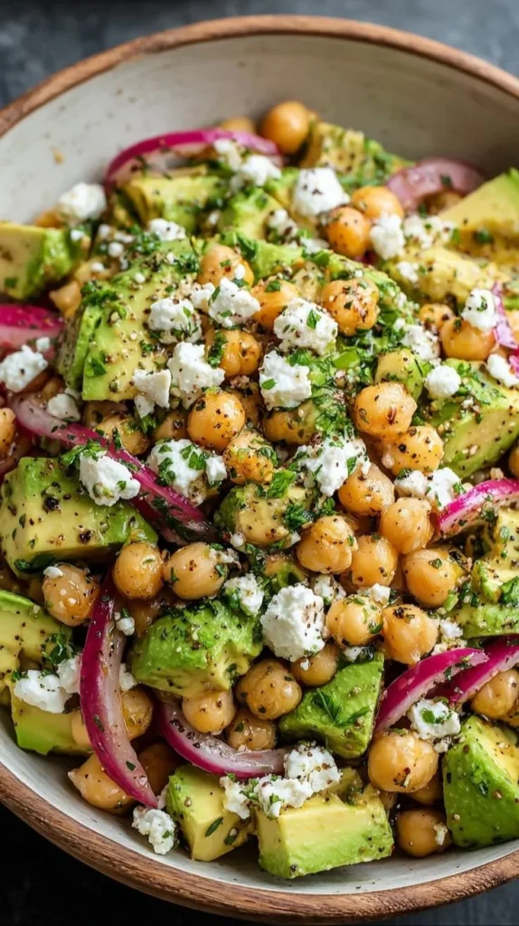 Chickpea Feta Avocado Salad with fresh ingredients in a bowl