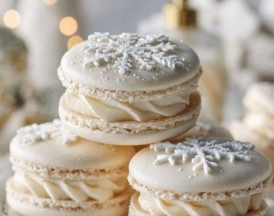 Snowflake macarons displayed on a festive plate
