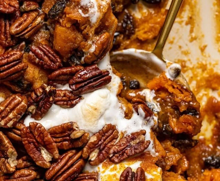 Delicious Southern Maple Sweet Potato Casserole topped with crunchy pecans