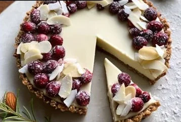 Delicious white chocolate cranberry tart with vibrant cranberry topping