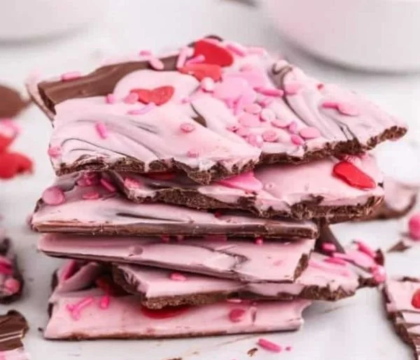 Valentine's Day chocolate bark with heart-shaped sprinkles and rich melted chocolate