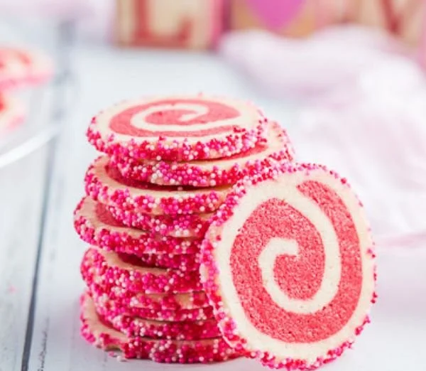Valentine's Day swirl cookies decorated with heart patterns and colorful swirls