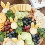 Charcuterie board featuring Babybel Bunnies for a fun family snack