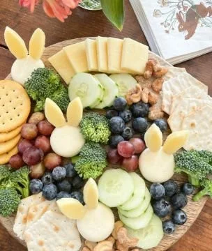 Charcuterie board featuring Babybel Bunnies for a fun family snack