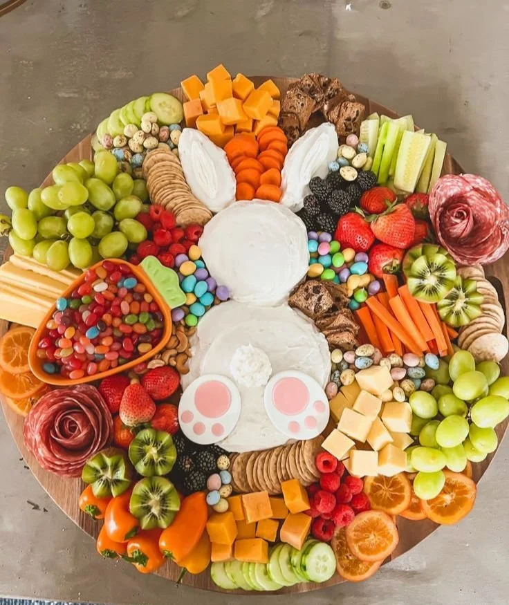 Beautiful Easter charcuterie board featuring seasonal treats and festive decorations