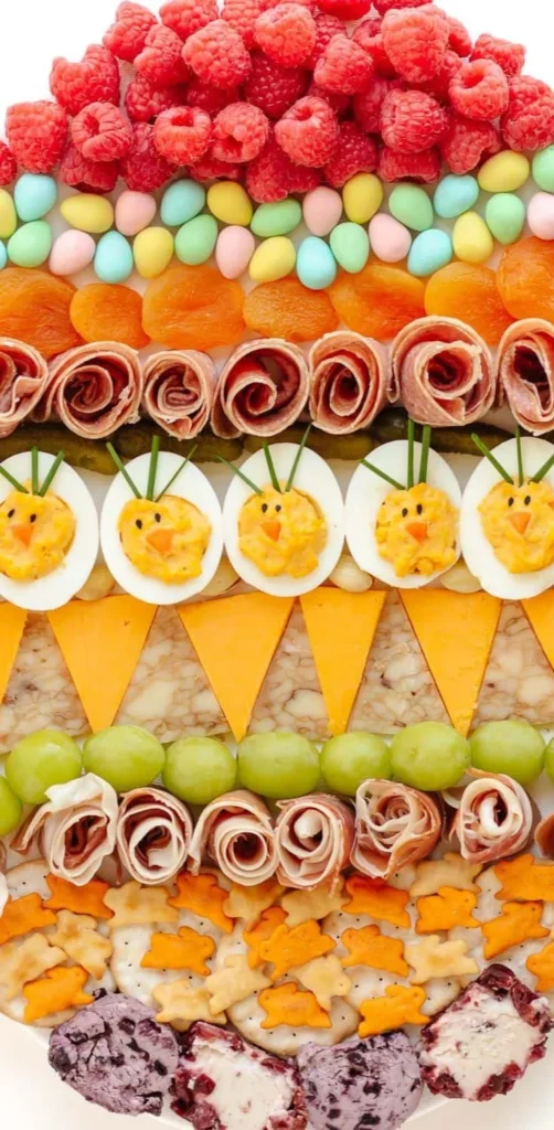 Colorful Easter charcuterie boards filled with seasonal snacks and decorations.